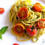 Vibrant Pesto Pasta with Juicy Cherry Tomatoes Delight