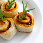 Sun-Dried Tomato Pesto Pinwheels: A Savory Twist to Snacktime