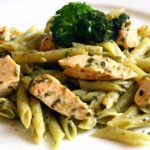 Herb-Infused Pesto Pasta with Tender Chicken Delight