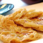 Roti Canai: The Flaky Delight from Malaysia’s Streets