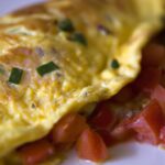 Cheesy Tomato Omelet: A Simple, Flavorful Morning Treat