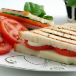Savor the Classic Tomato and Mozzarella Sandwich Delight