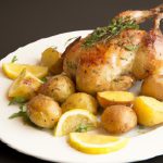 Zesty Lemon Herb Roasted Chicken with Golden Potatoes Delight